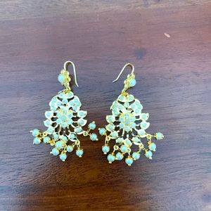 White pearl earrings.